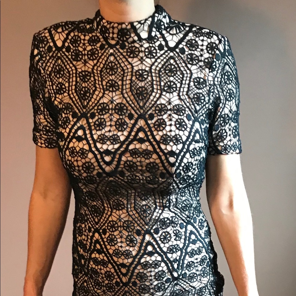 Mid neck, semi backless dress.